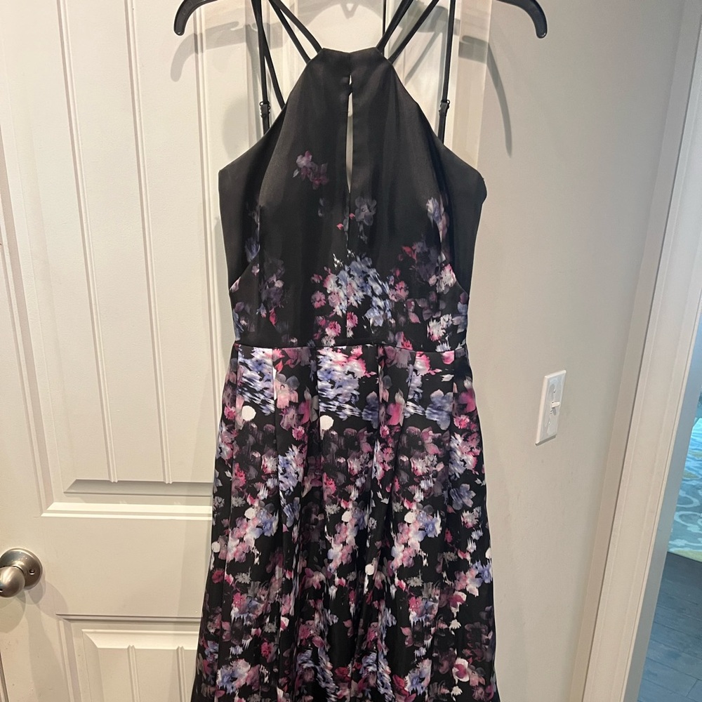 Womens long dress. Size 4, but fits womens size 2, and 4. High-low